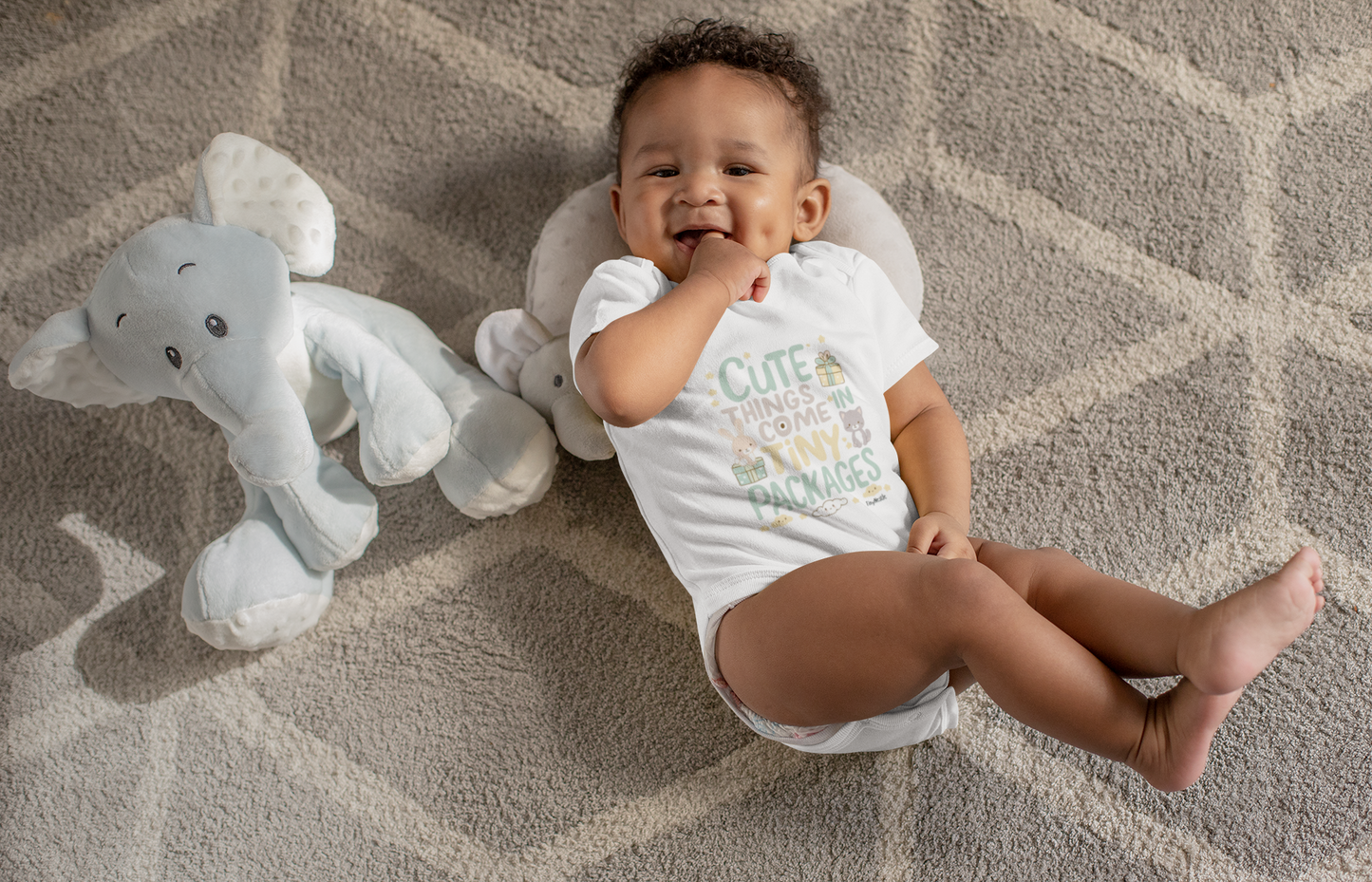 baby wearing a Cute Things Come In Tiny Packages Short Sleeve white Bodysuit